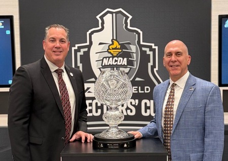 Mt. SAC Director of Athletics Joe Jennum (left) accepts the Learfield Directors' Cup.